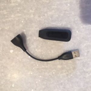 Fitbit One Activity Tracker (and charger)